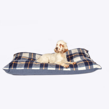 Danish Design Bowmore Navy Duvet Dog Bed with a dog laying on the bed