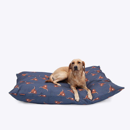 A dog stretching out fully on the spacious Bramblehorn Deep Duvet mattress bed to show size and comfort.