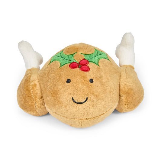 Plush toy resembling a roasted turkey with a holly leaf and berries 